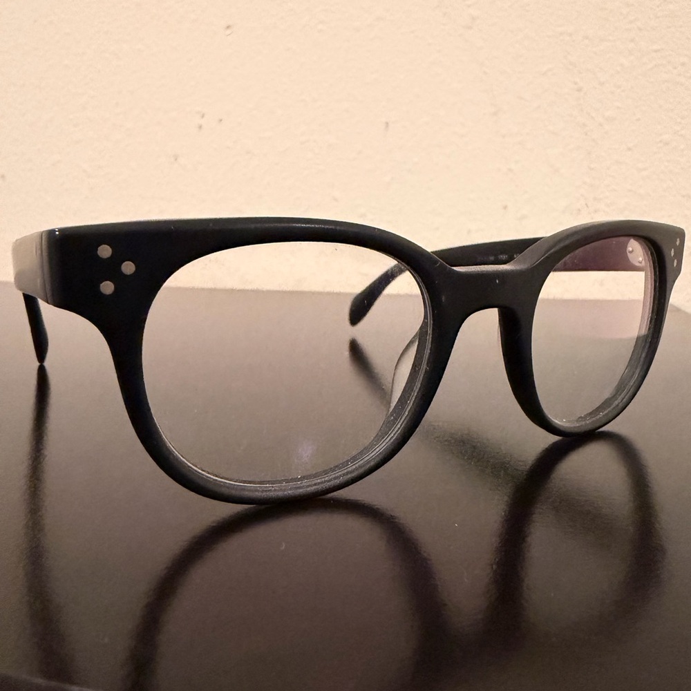 Oliver Peoples Aston 1031 Eyeglasses – Matte Black Classic Frames (49□22 145)